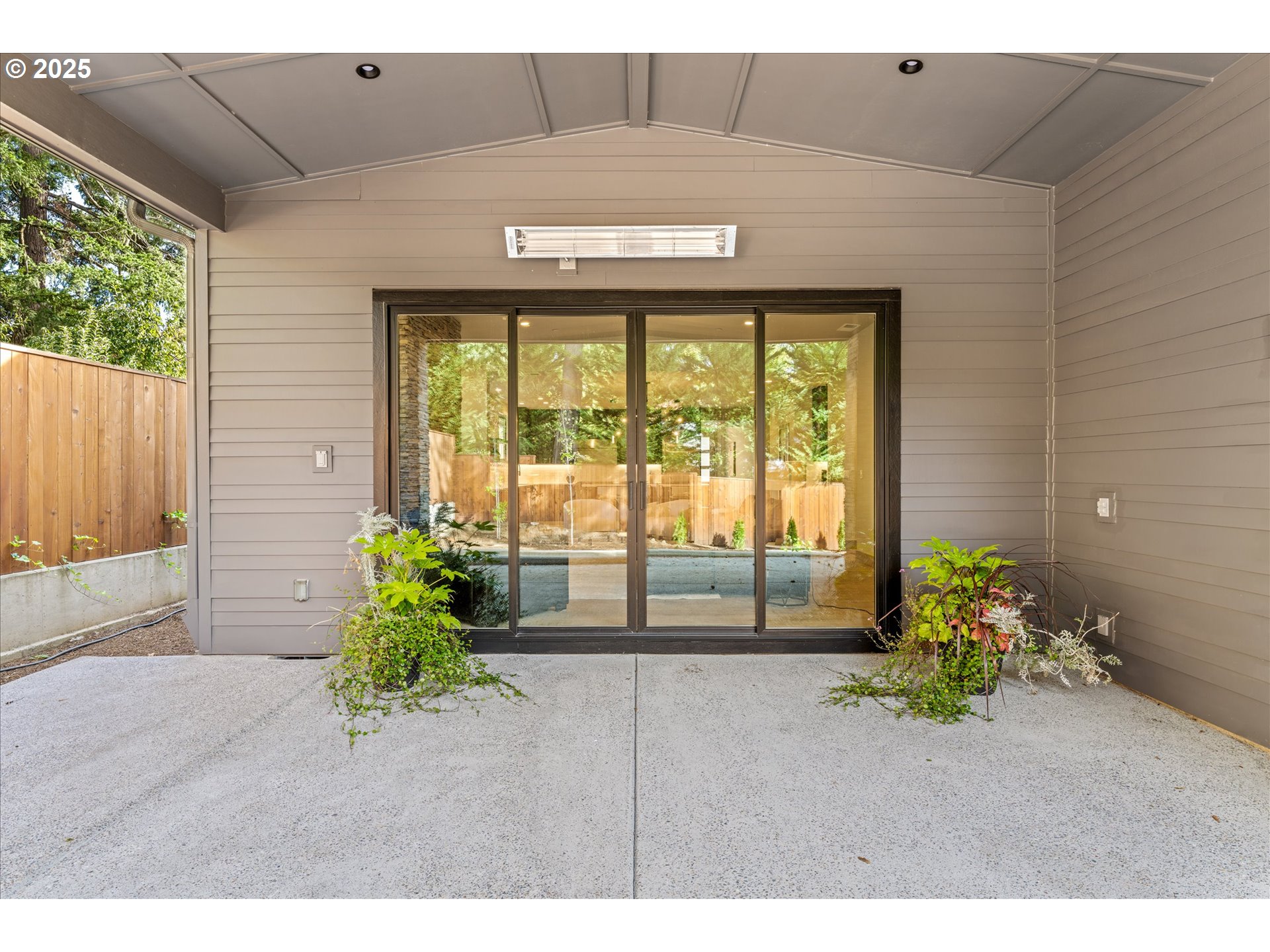 15003 Twin Fir Road Lake Oswego, OR 97035 - Photo 41 of 42 a front view of a house with a garden