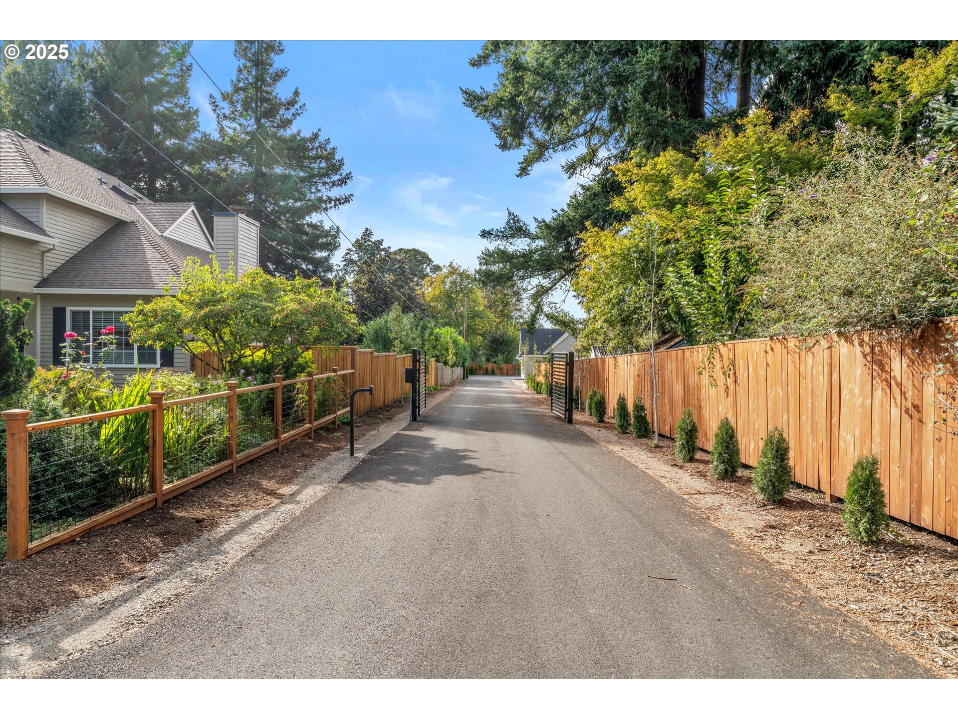 15003 Twin Fir Road Lake Oswego, OR 97035 - Photo 42 of 42 a backyard of a house with lots of green space