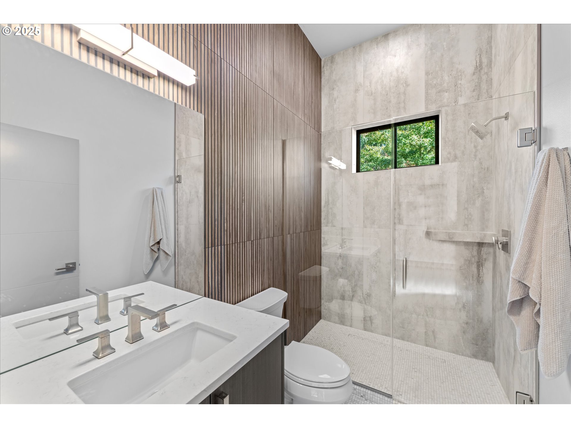 15003 Twin Fir Road Lake Oswego, OR 97035 - Photo 6 of 42 a bathroom with a sink a toilet and shower