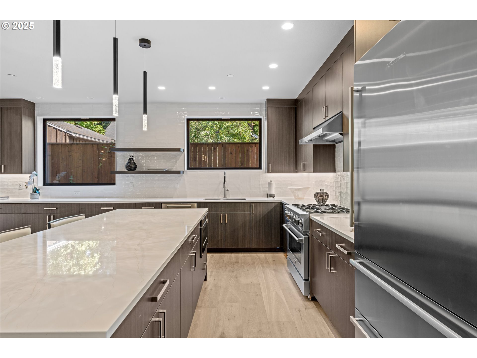 15003 Twin Fir Road Lake Oswego, OR 97035 - Photo 7 of 42 a kitchen with a sink stove and refrigerator