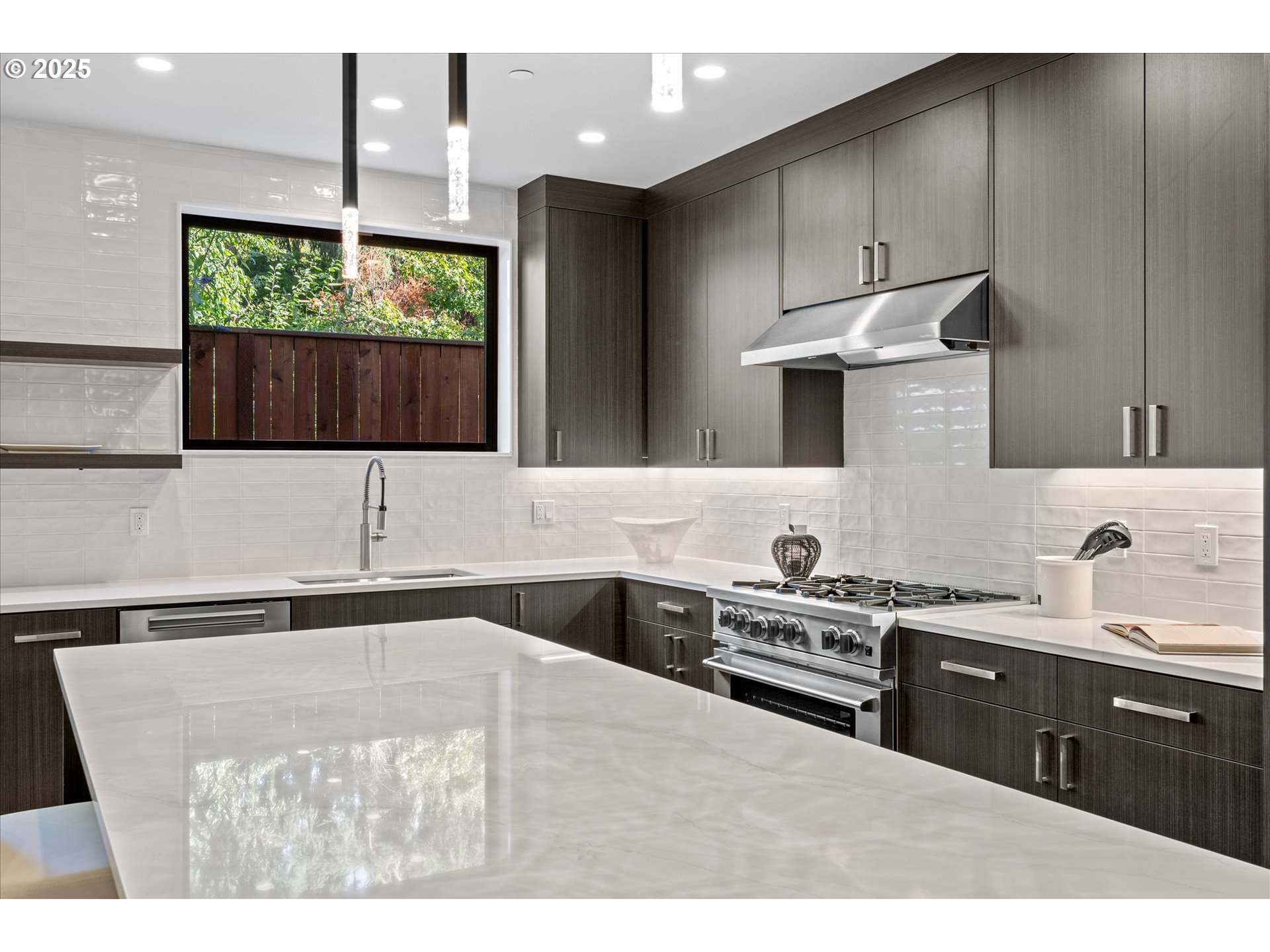 15003 Twin Fir Road Lake Oswego, OR 97035 - Photo 8 of 42 a kitchen with a sink a counter top space and appliances