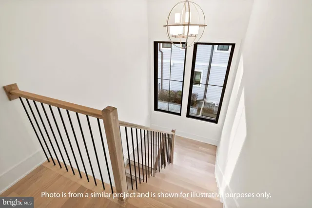 a view of livingroom with floor to ceiling window and wooden floor