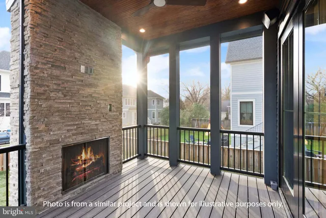 a view of a balcony from an empty room
