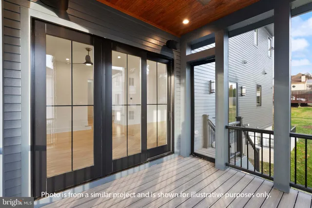a view of a hallway with a cabinet and mirror