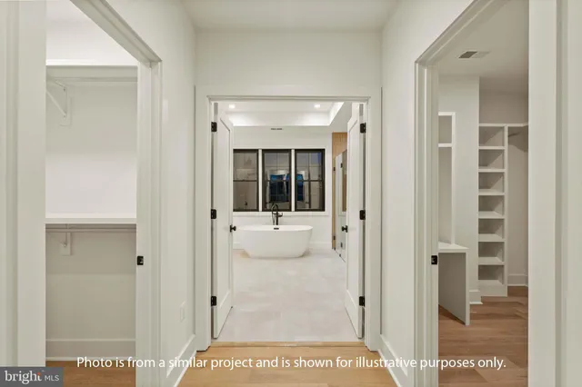 a bathroom with a bathtub and shower