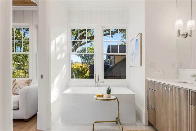 a bathroom with sink and mirror