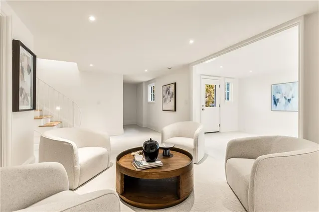 a living room with furniture and a couch