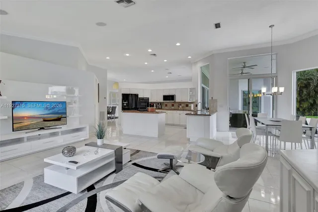 a bathroom with a granite countertop sink toilet a mirror and shower