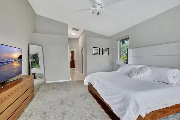 a view of a backyard of the house