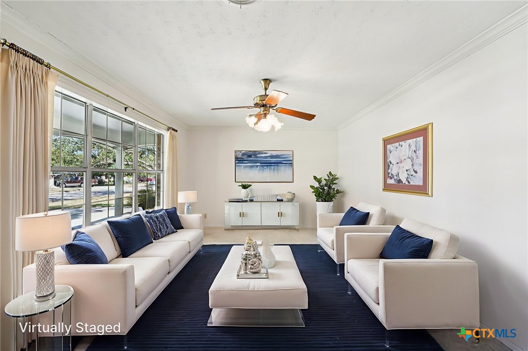 2205 South 53rd Street Temple, TX 76504 - Photo 11 of 44 a living room with furniture and a large window