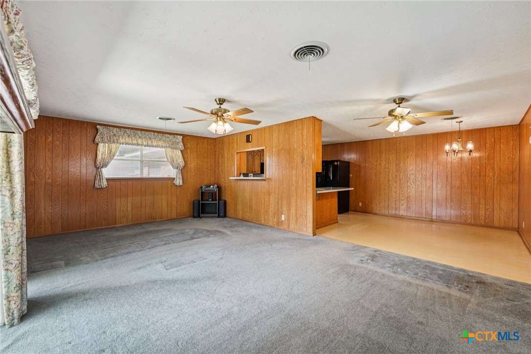 2205 South 53rd Street Temple, TX 76504 - Photo 17 of 44 an empty room with windows and cabinet