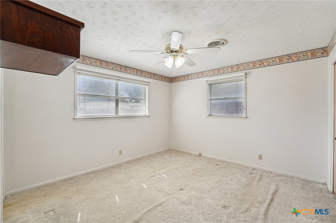 2205 South 53rd Street Temple, TX 76504 - Photo 21 of 44 a view of an empty room with a window