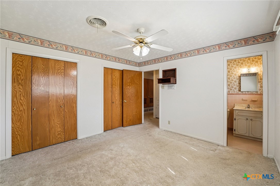 2205 South 53rd Street Temple, TX 76504 - Photo 23 of 44 a view of a livingroom with a chandelier fan