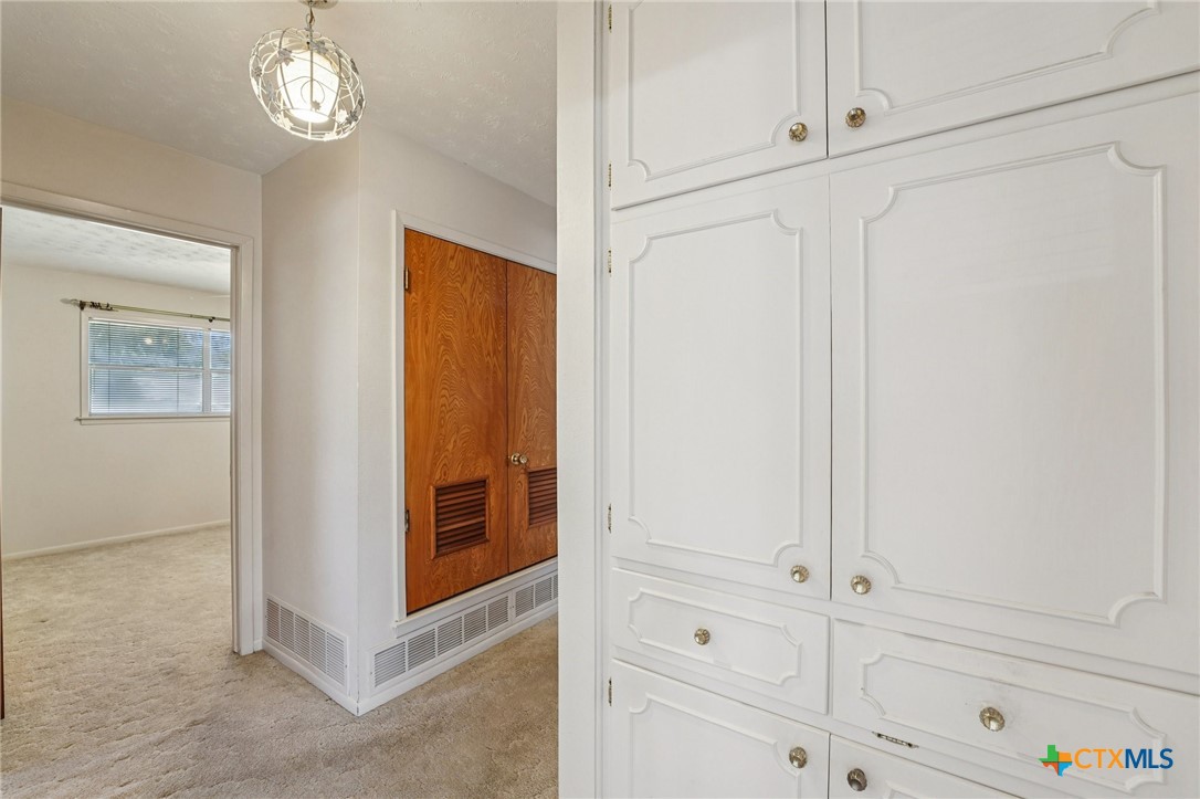 2205 South 53rd Street Temple, TX 76504 - Photo 25 of 44 a view of an entryway with wooden floor