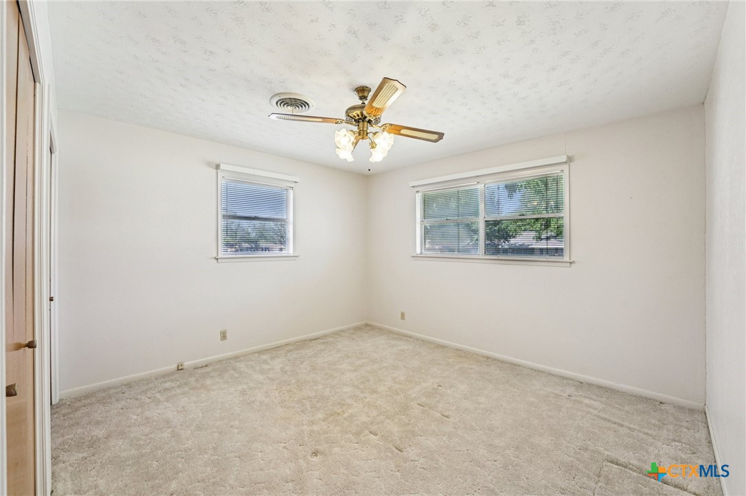 2205 South 53rd Street Temple, TX 76504 - Photo 27 of 44 a view of an empty room with a window
