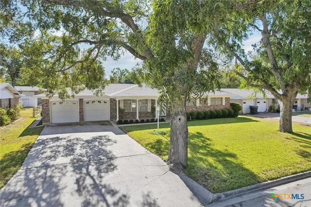 a view of a house with garden