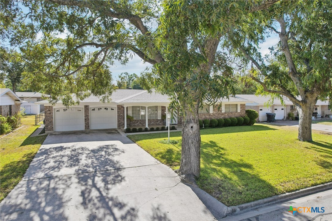 2205 South 53rd Street Temple, TX 76504 - Photo 4 of 44 a view of a house with garden