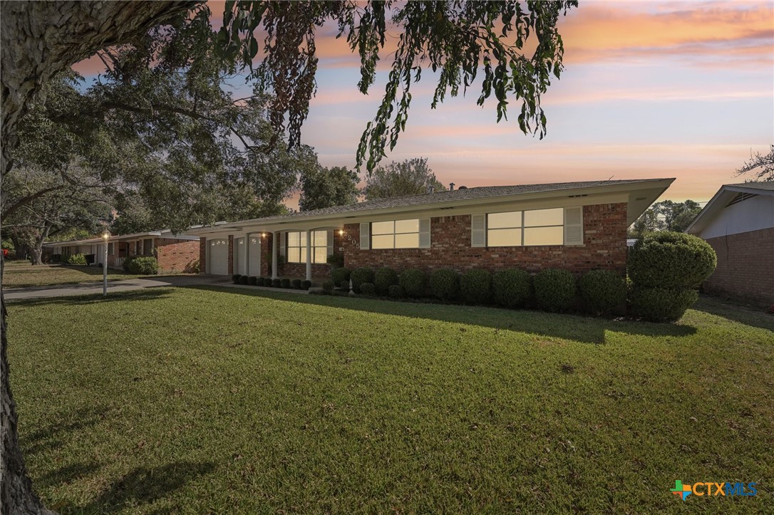 2205 South 53rd Street Temple, TX 76504 - Photo 41 of 44 a view of a house with backyard and garden