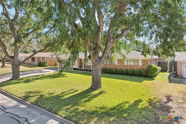 a view of a house with swimming pool