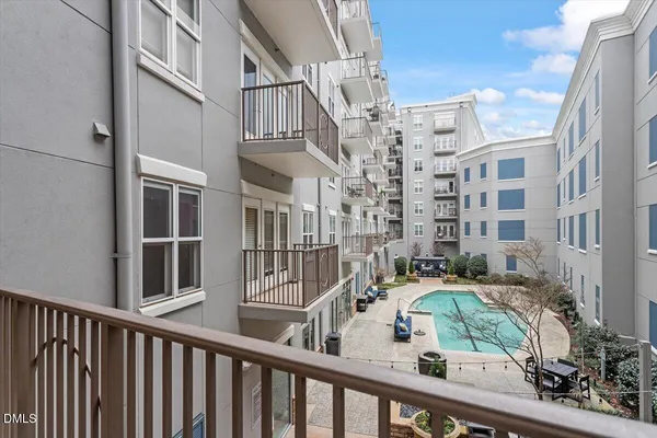 a view of buildings from a balcony