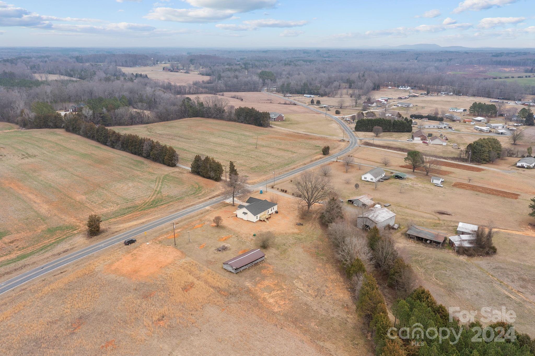 220 Linker Road Rockwell, NC 28138 - Photo 47 of 48 an aerial view of residential houses with outdoor space