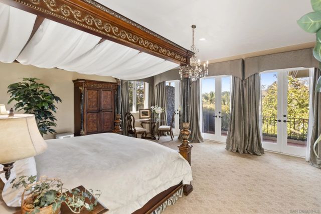 a large bathroom with a double vanity sink mirror and