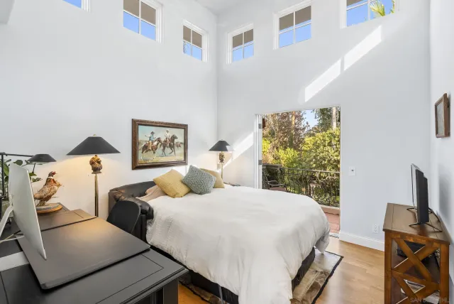 a kitchen with granite countertop a sink and a stove top oven