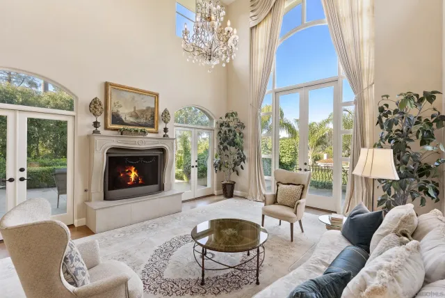 a view of living room kitchen with furniture and outdoor view