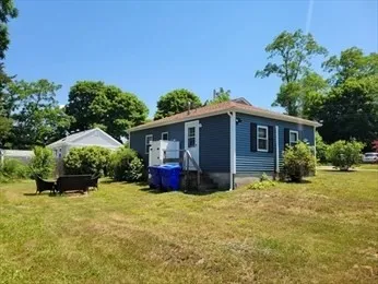 a view of house with yard and entertaining space