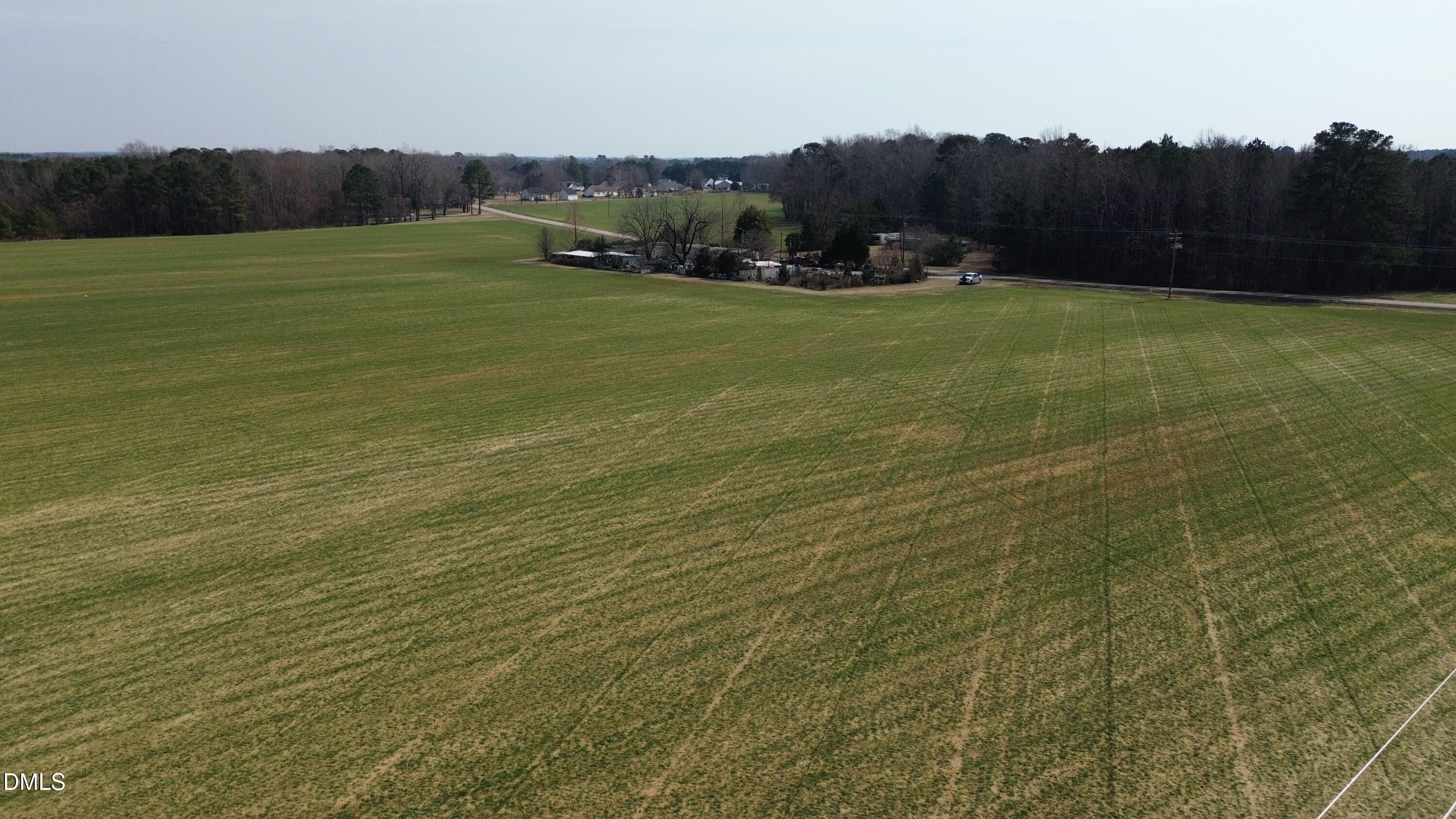 3811 Lake Wendell Road Wendell, NC 27591 - Photo 4 of 5 a view of a lush green field