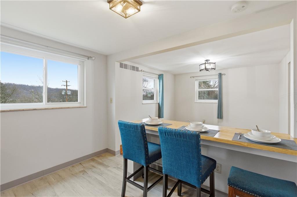 969 4th Street Baden, PA 15005 - Photo 11 of 28 a dining room with furniture and window