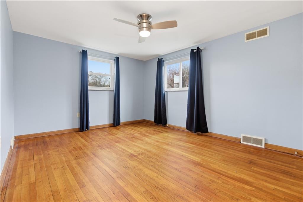 969 4th Street Baden, PA 15005 - Photo 15 of 28 a view of empty room with wooden floor