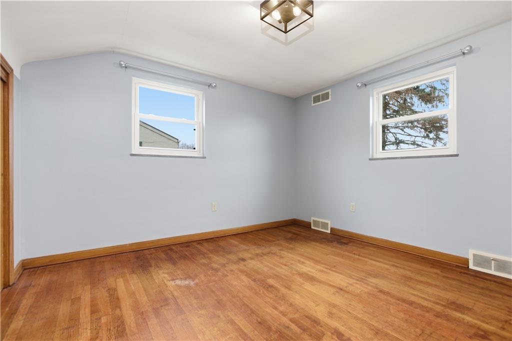 969 4th Street Baden, PA 15005 - Photo 20 of 28 a view of an empty room with a window