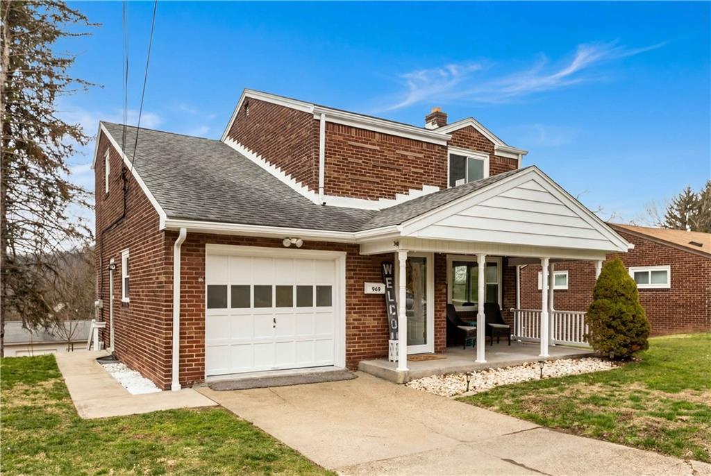 969 4th Street Baden, PA 15005 - Photo 2 of 28 a front view of a house with a porch