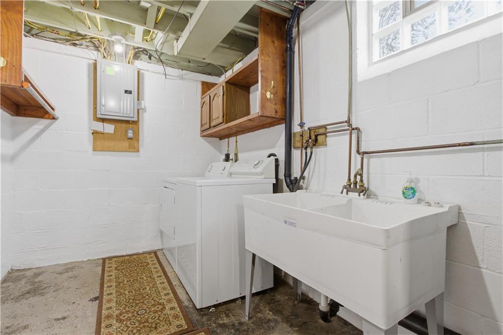 969 4th Street Baden, PA 15005 - Photo 24 of 28 a bathroom with a sink and a mirror