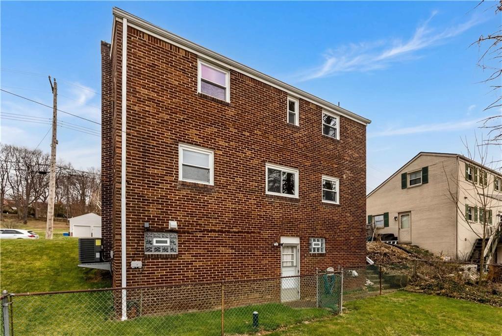 969 4th Street Baden, PA 15005 - Photo 28 of 28 a front view of a house with garden