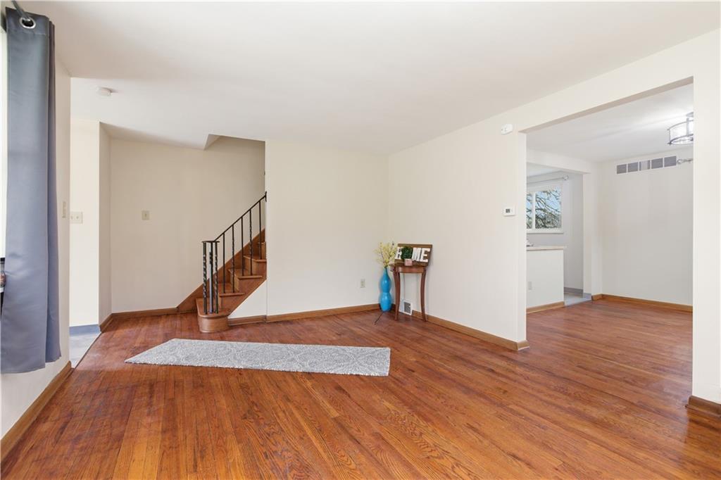 969 4th Street Baden, PA 15005 - Photo 6 of 28 a view of empty room with wooden floor