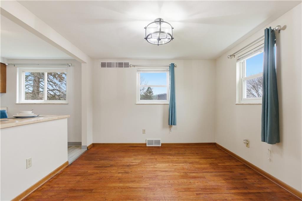 969 4th Street Baden, PA 15005 - Photo 8 of 28 a view of empty room with wooden floor and window