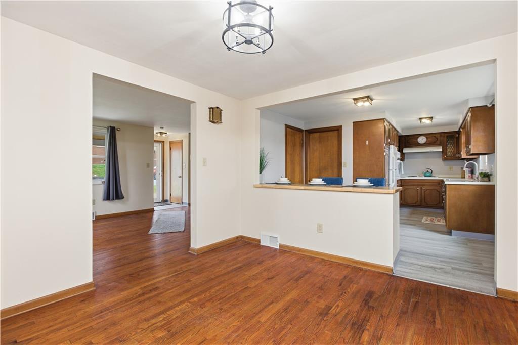969 4th Street Baden, PA 15005 - Photo 9 of 28 a view interior of a house and kitchen with sink wooden floor and windows