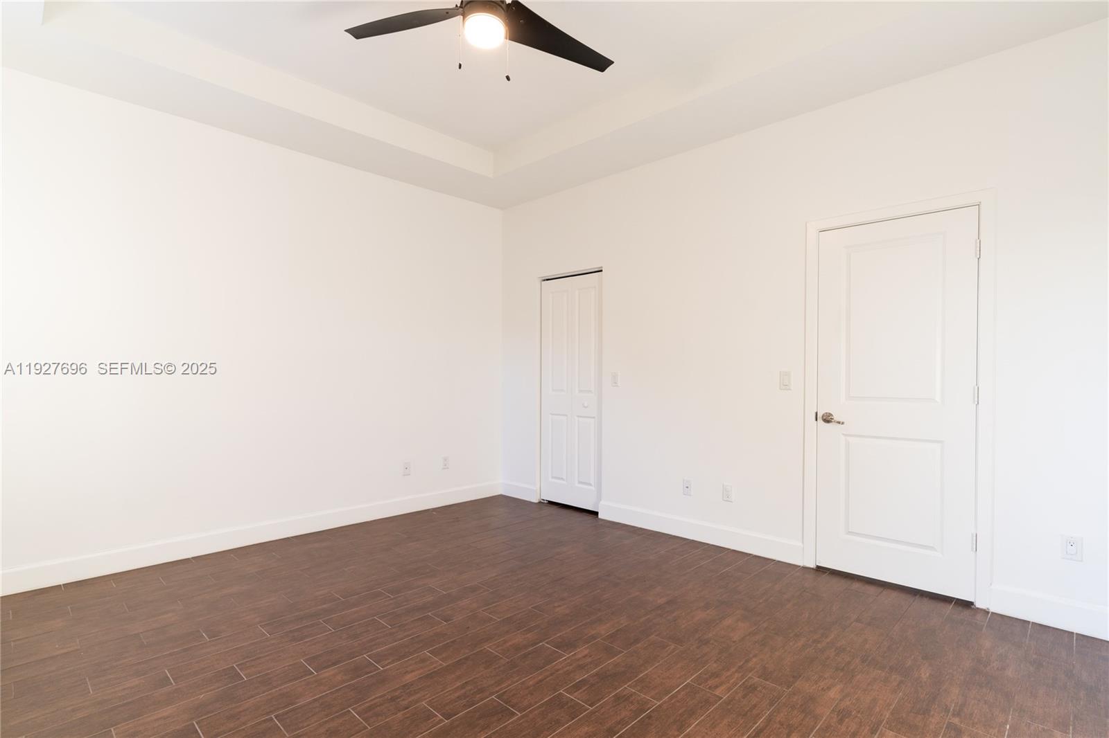 4638 Northwest 59th Street Tamarac, FL 33319 - Photo 13 of 34 an empty room with an entryway