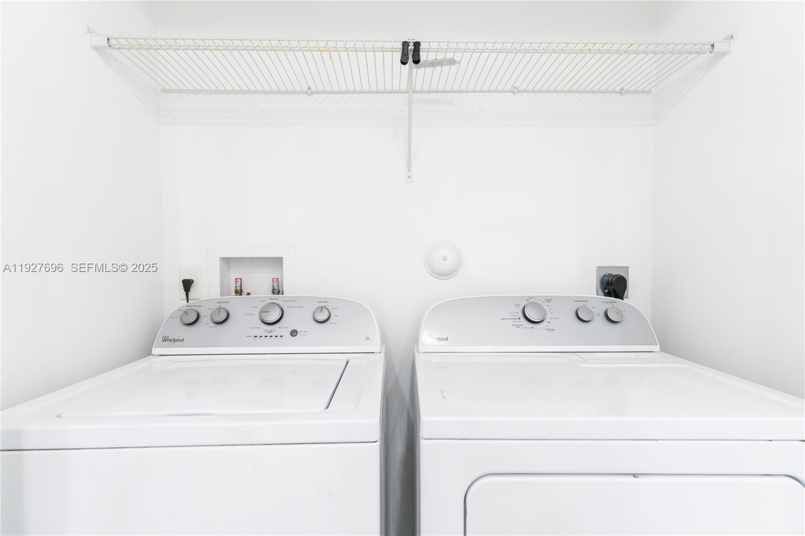 4638 Northwest 59th Street Tamarac, FL 33319 - Photo 27 of 34 a utility room with dryer and washer