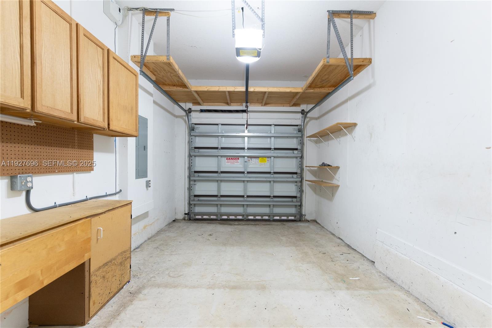 4638 Northwest 59th Street Tamarac, FL 33319 - Photo 28 of 34 a view of storage and utility room