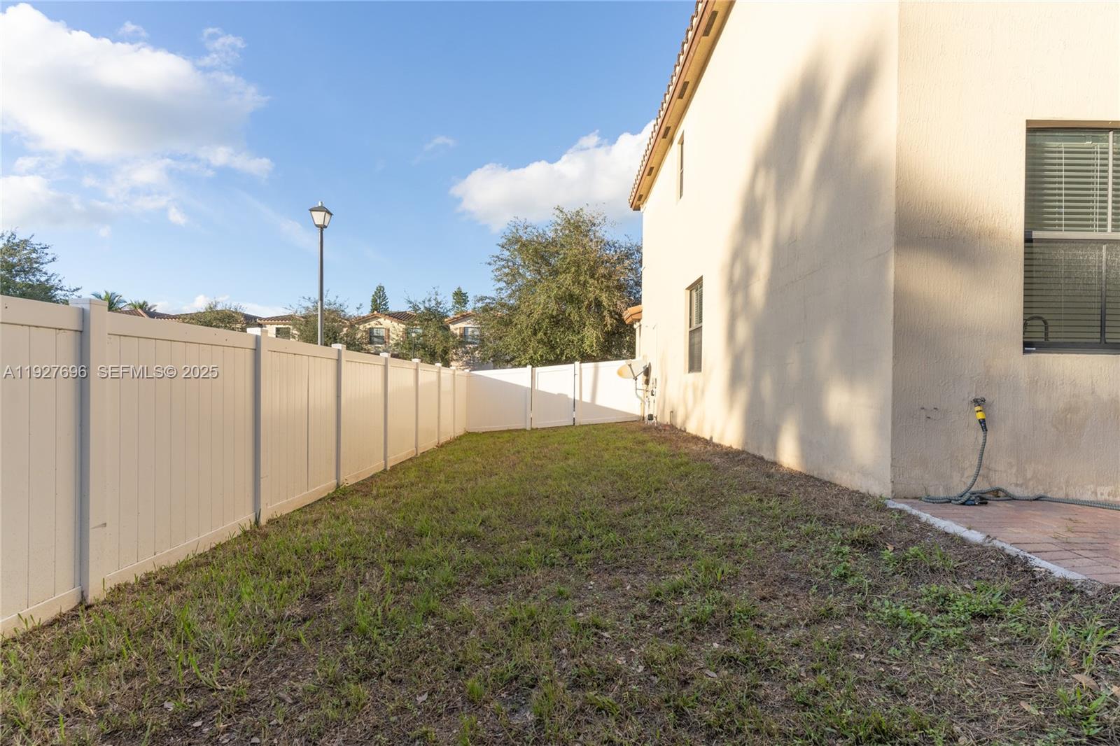 4638 Northwest 59th Street Tamarac, FL 33319 - Photo 30 of 34 a view of a backyard