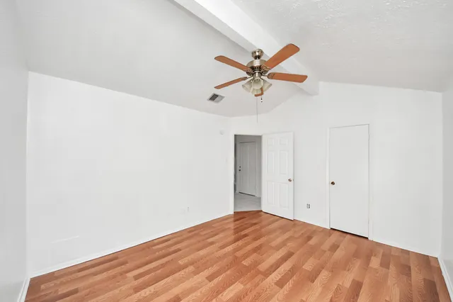 a view of a big room with wooden floor