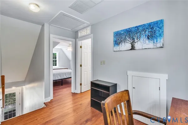a view of a lake with sitting area