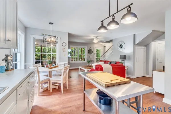 a view of a livingroom with furniture and wooden floor