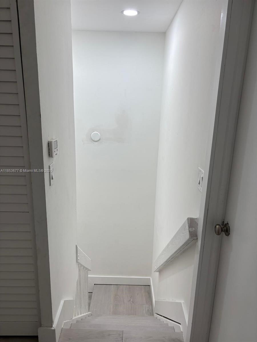 6886 Northwest 166th Terrace, Unit 1004 Miami Lakes, FL 33014 - Photo 17 of 27 a view of closet