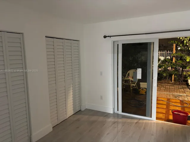 a view of a patio in a backyard
