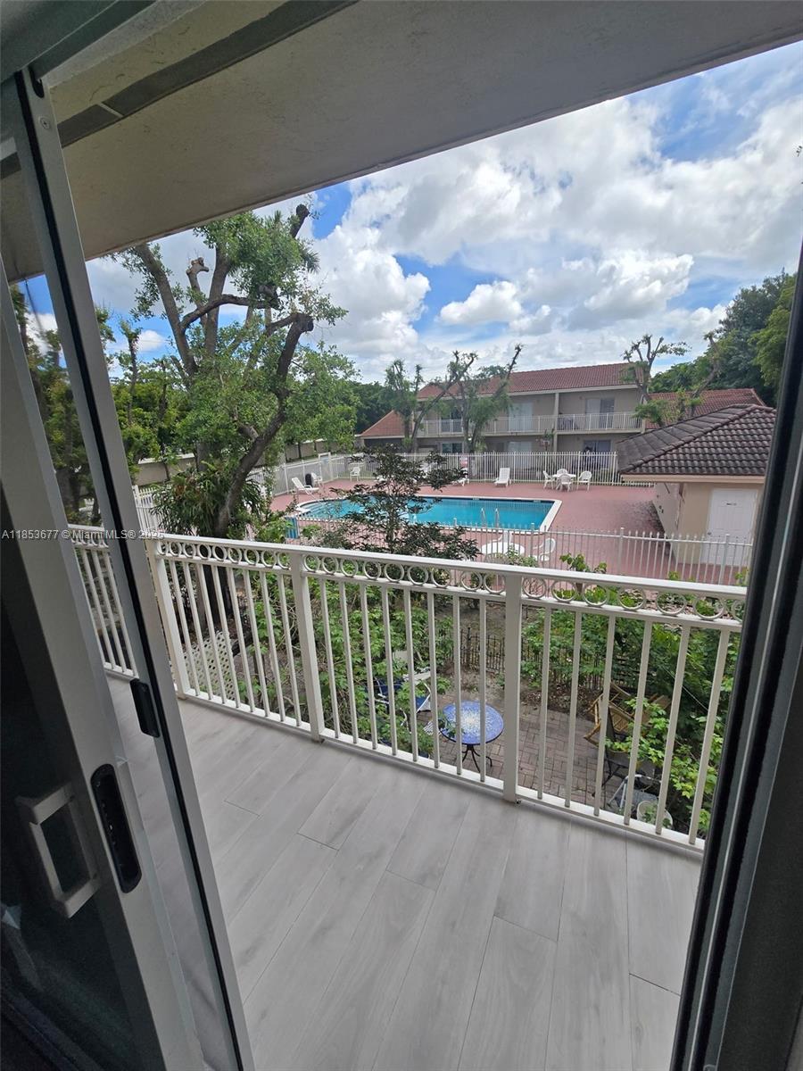 6886 Northwest 166th Terrace, Unit 1004 Miami Lakes, FL 33014 - Photo 10 of 27 a view of a balcony