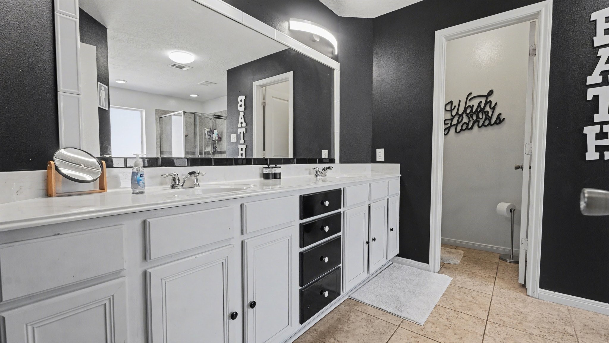 210 Milo Street Dayton, TX 77535 - Photo 12 of 24 Primary Bath offers double vanity